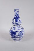 A Chinese blue and white porcelain double gourd vase decorated with the Eight Immortals, 4 character