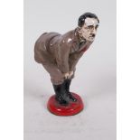 A humourous and derogatory cold painted figure of Adolf Hitler, 4½" high