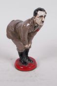 A humourous and derogatory cold painted figure of Adolf Hitler, 4½" high