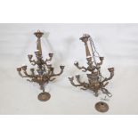 A pair of bronzed metal nine branch chandeliers, 33" high