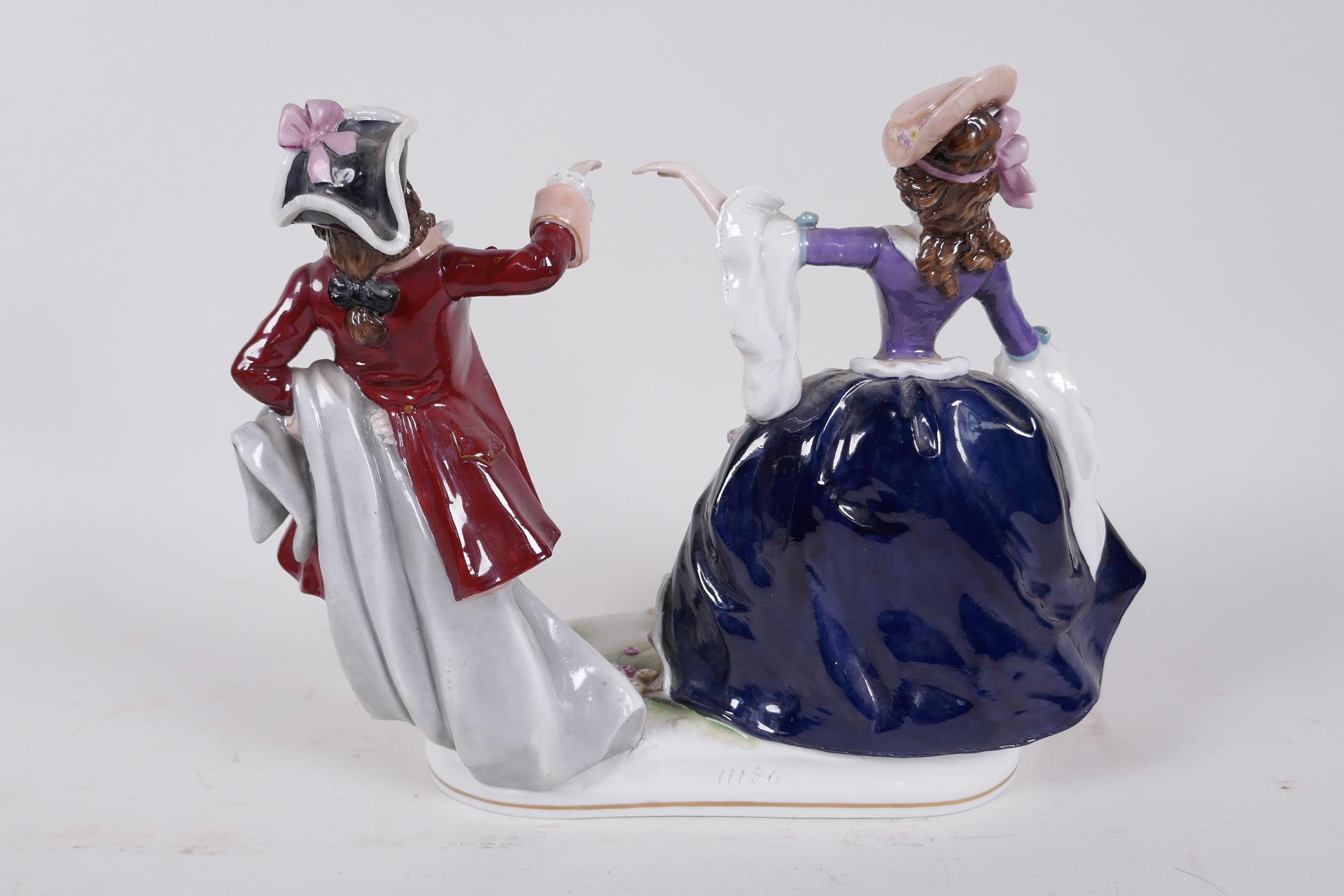A Continental porcelain figure of a couple dancing, 9" high - Image 4 of 6