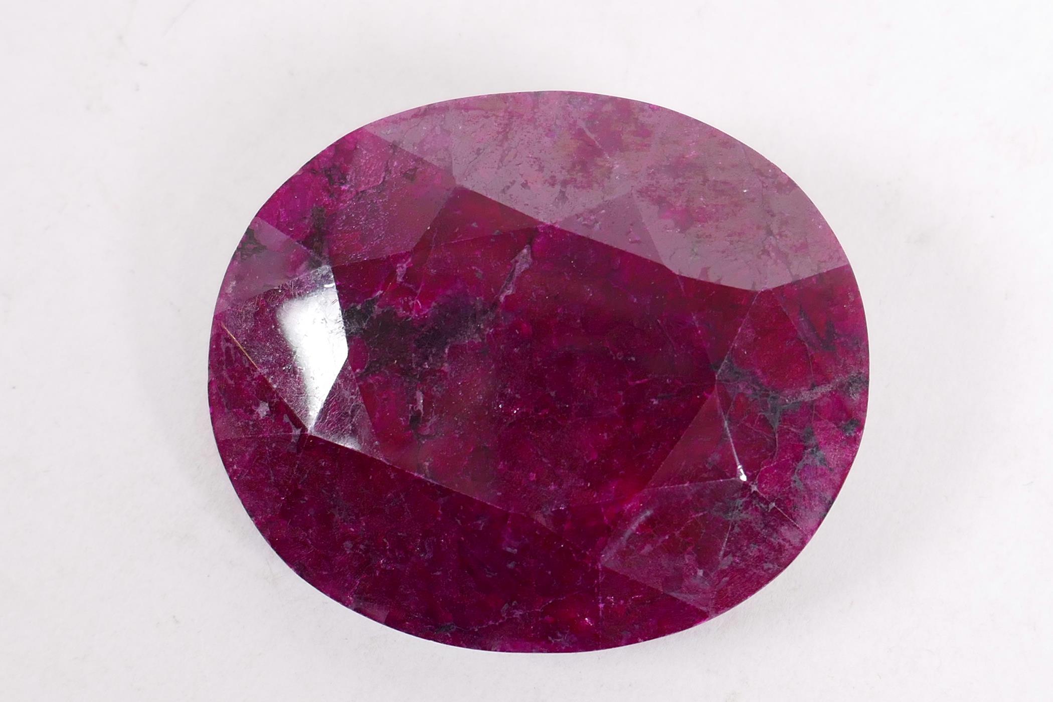 A 295ct natural ruby gemstone, oval cut, with certification from the Gemological Laboratory of India - Image 5 of 6