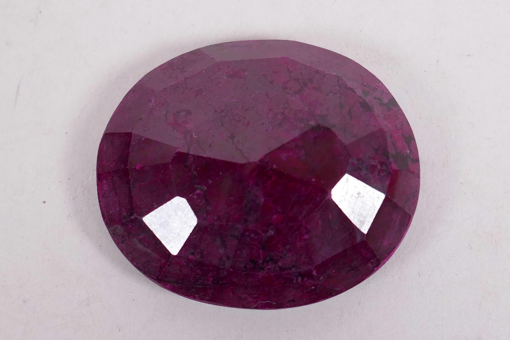 A 295ct natural ruby gemstone, oval cut, with certification from the Gemological Laboratory of India - Image 4 of 6