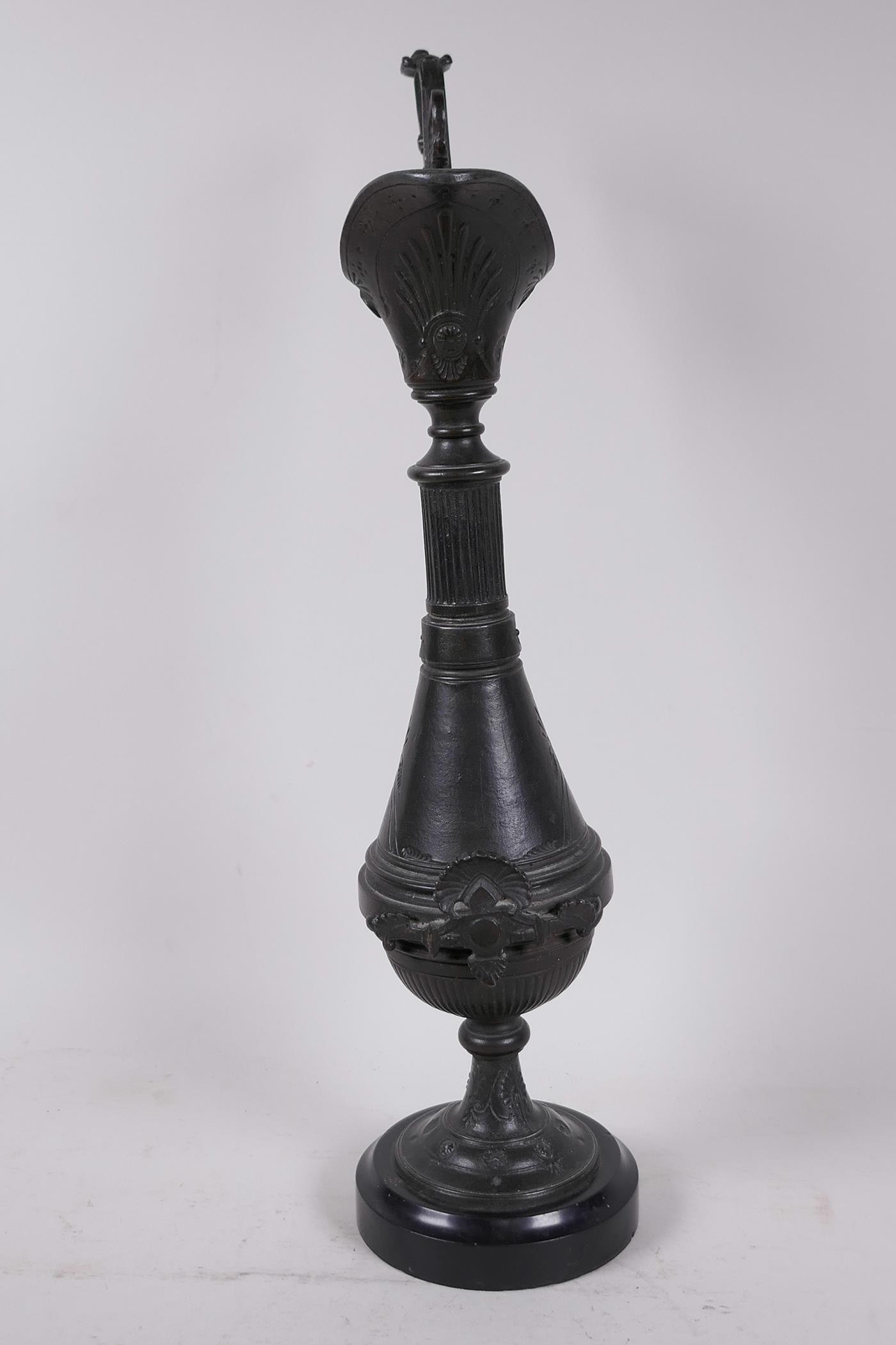 A C19th aesthetic bronze ewer with engraved and applied decoration, mounted on a marble base, 17" - Image 4 of 5