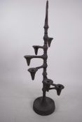 A Danish designer metal seven light candlestick by Jens Quistgaard, 18½" high