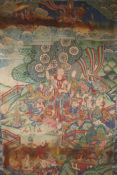 A Tibetan printed material thangka with silk borders, 32" x 42"