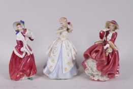 Three Royal Doulton lady figurines, 'Christmas Morn' HN1992, 'Laura' HN2960 and 'Top o' the Hill'