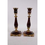 A pair of C19th French red marble and ormolu candlesticks, 10½" high