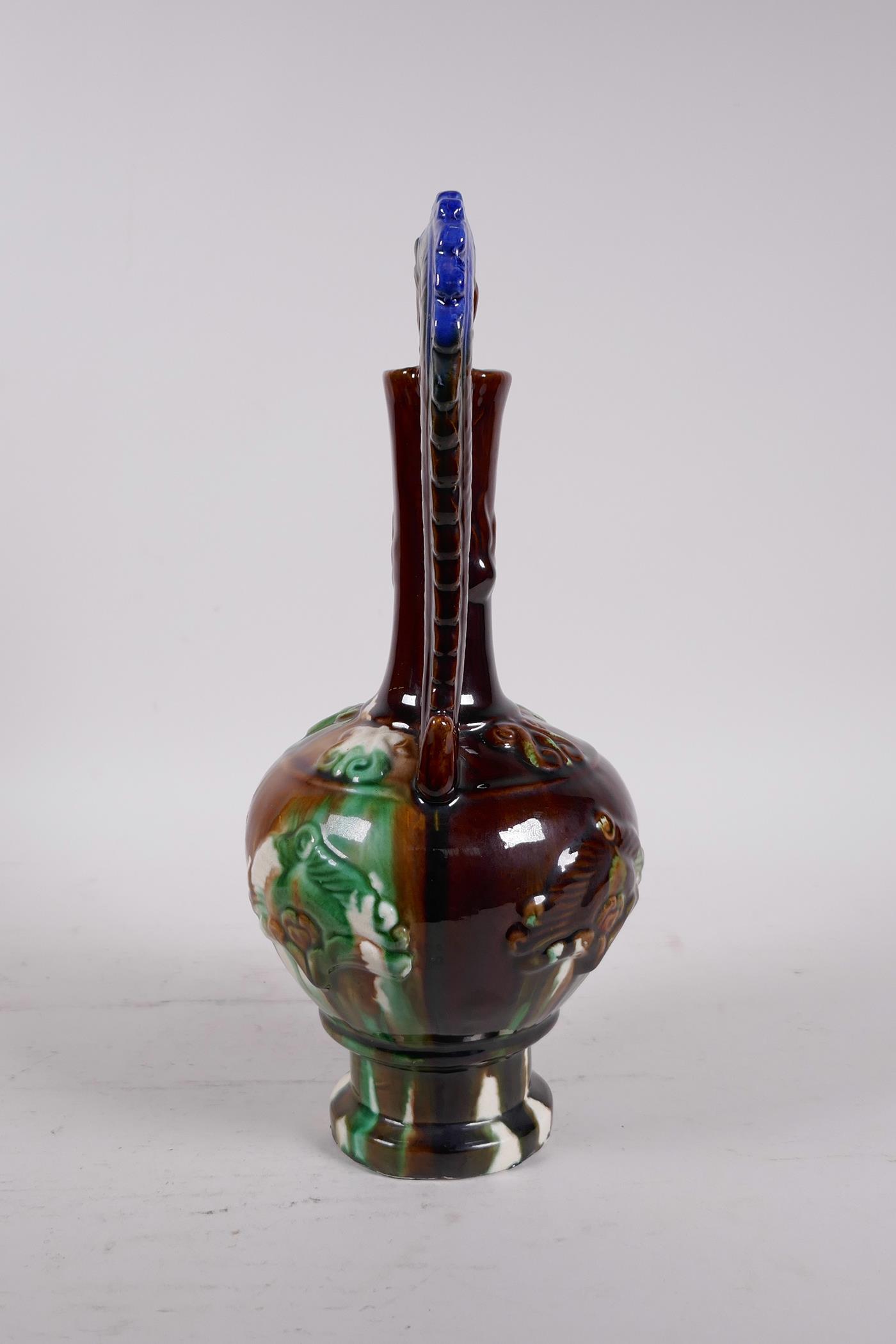 A Chinese Sancai glazed pottery vase with a slender neck and two handles in the form of dragons, - Image 2 of 6