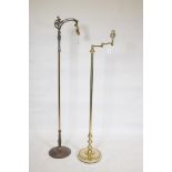 A brass adjustable floor lamp, 52" high, and another