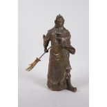 A Chinese filled bronze figure of Guan Yu, 4 character impressed mark to base, 10½" high