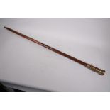 A two piece hardwood walking stick with brass compass and telescope handle, 38" long