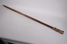 A two piece hardwood walking stick with brass compass and telescope handle, 38" long