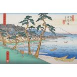 A Japanese block print depicting fishing boats, a seaside village and a distant mount Fuji, 11" x