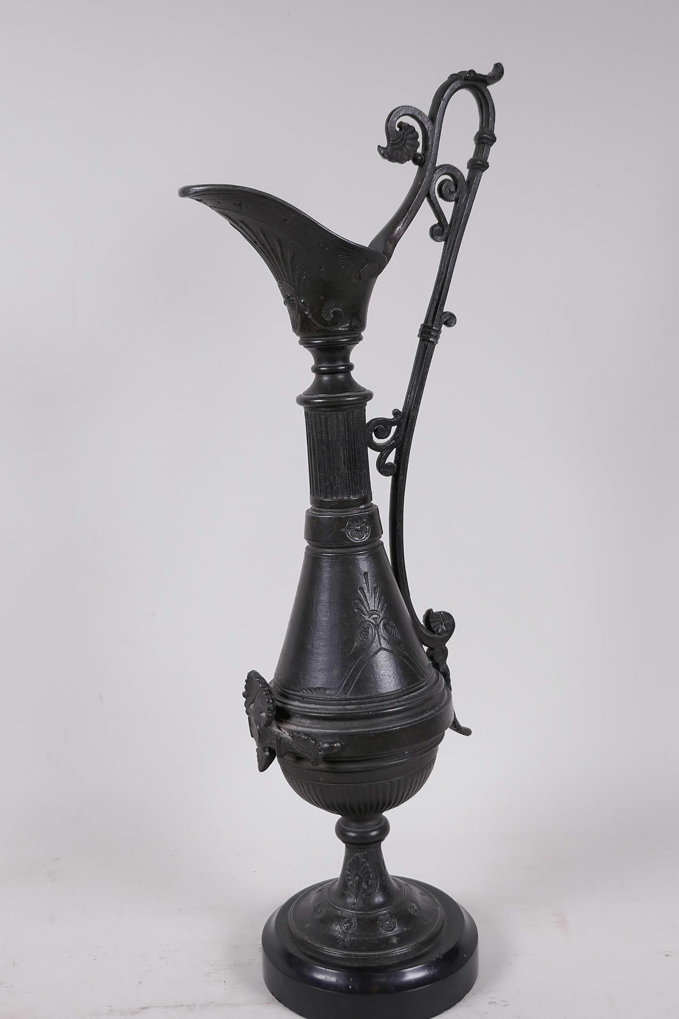 A C19th aesthetic bronze ewer with engraved and applied decoration, mounted on a marble base, 17" - Image 5 of 5