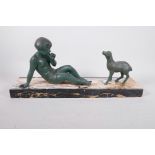 An Art Deco bronzed spelter figure of a young girl and lamb, mounted on a marble base, signed Van de