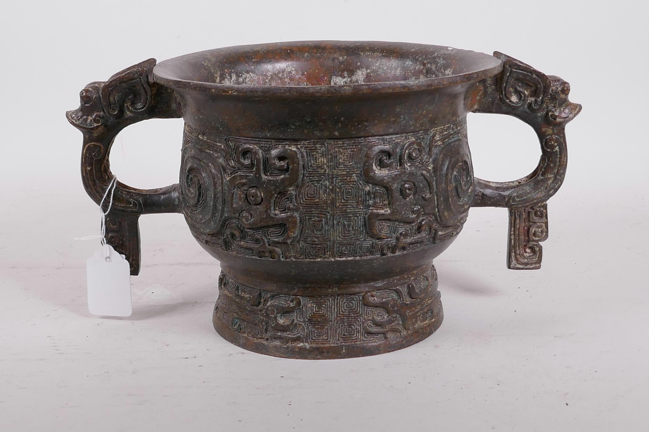 A Chinese bronze two handled censer with raised archaic style decoration, 12" x 6" high - Image 3 of 5