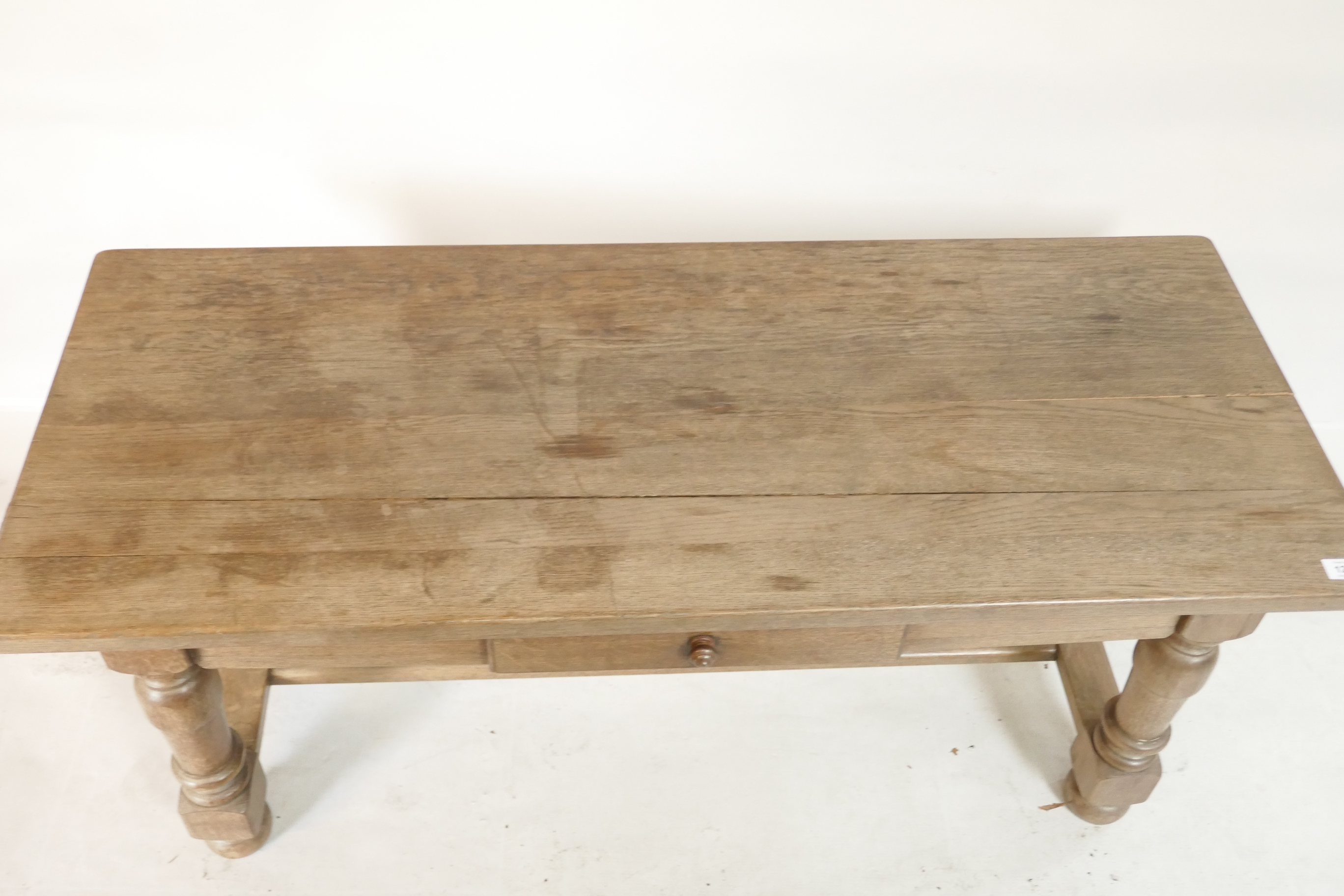 A bleached oak coffee table, with single drawer raised on turned supports united by an 'H' - Image 2 of 2
