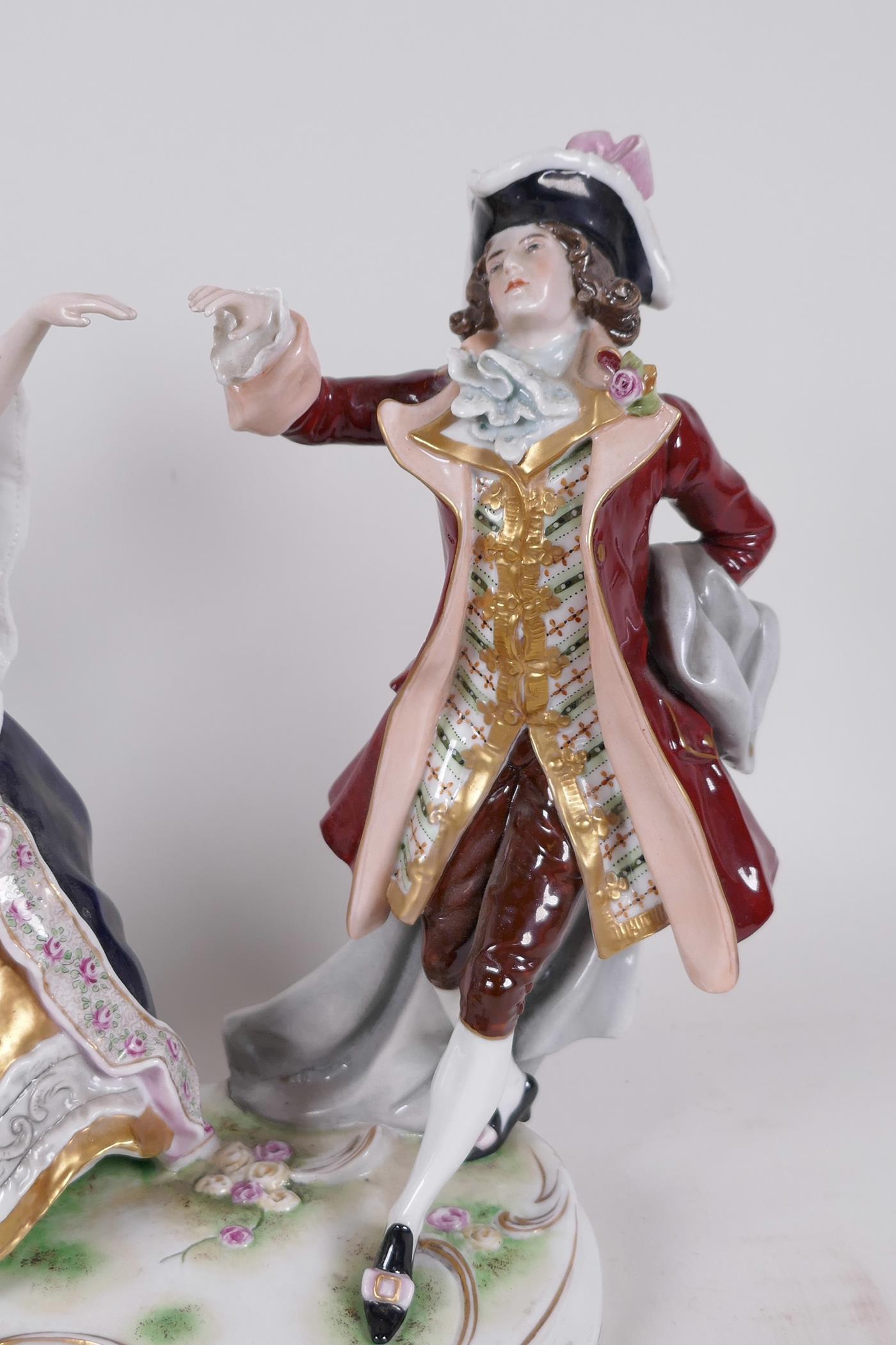 A Continental porcelain figure of a couple dancing, 9" high - Image 3 of 6