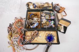 A quantity of costume jewellery, badges, watches and Minetta miniature camera