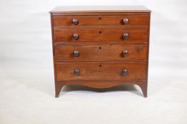 A George III mahogany chest of four long drawers, with cockbeaded detail and original wood