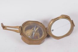 A brass cased sighting compass, 3" diameter