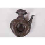 An antique Chinese bronze ewer cast as two fish spouting water, with dragon spout, 7" high (hinged