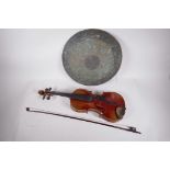 A vintage violin with a two piece back, A/F, and a bow, together with a bronze gong, violin 24" long