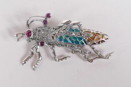 A 925 silver and plique a jour brooch in the form of a grasshopper, 2" long