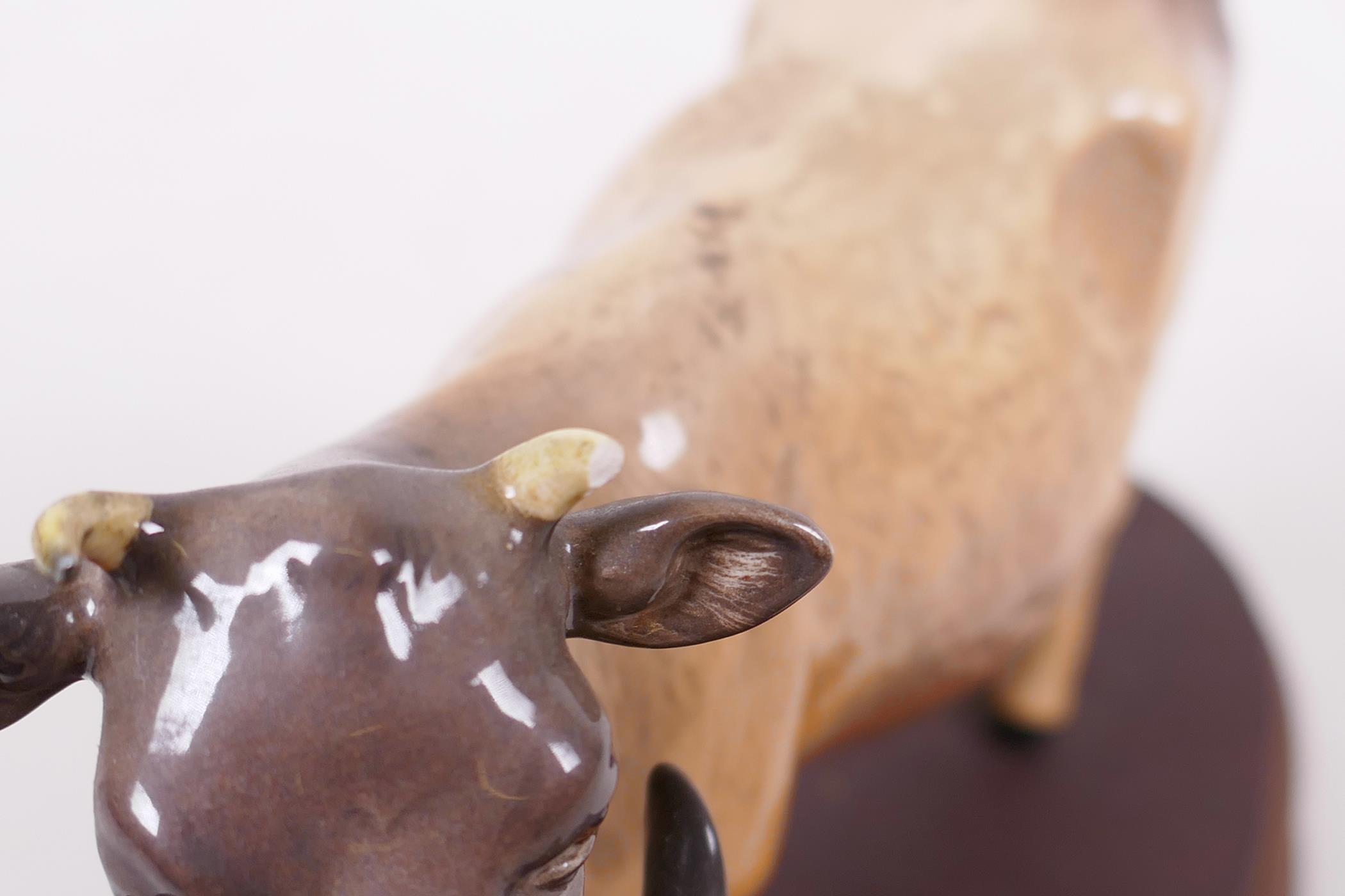 A Beswick figure of a Jersey cow and calf, on a wooden stand, 9½" long, A/F - Image 3 of 3