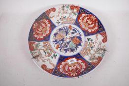 A Meiji Imari charger with typical decoration, 15½" diameter