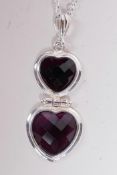 A 925 silver and amethyst double heart shaped pendant necklace, 1½" drop