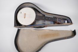 A Keech banjo ukulele, A/F, in hard case