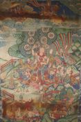 A Tibetan printed textile thangka with silk borders, 32" x 42"