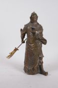 A Chinese filled bronze figure of Guan Yu, 4 character impressed mark to base, 10½" high