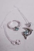 A duo of matching moissanite gemstone jewellery including a 0.7ct dolphin pendant and a 0.3ct blue