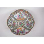 A late C19th Canton famille rose porcelain serving dish of petal form, the side handle decorated