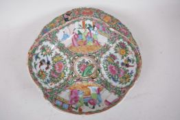 A late C19th Canton famille rose porcelain serving dish of petal form, the side handle decorated