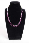 A pearl and ruby drops necklace with matching dangler earrings, length 18"