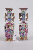 A pair of C19th Cantonese famille verte bud vases, one with repaired handle, 6" high