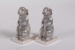 A pair of silver plated condiments in the form of rabbits, stamped 800, 2½" high