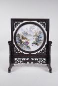 A Chinese Republic style polychrome porcelain revolving table screen decorated with a riverside