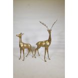 A hollow brass cast model of a buck and roe deer