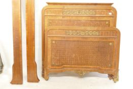 A C19th French walnut bed with parquetry inlaid head and footboard, and ormolu mounts, 49" x 51" x