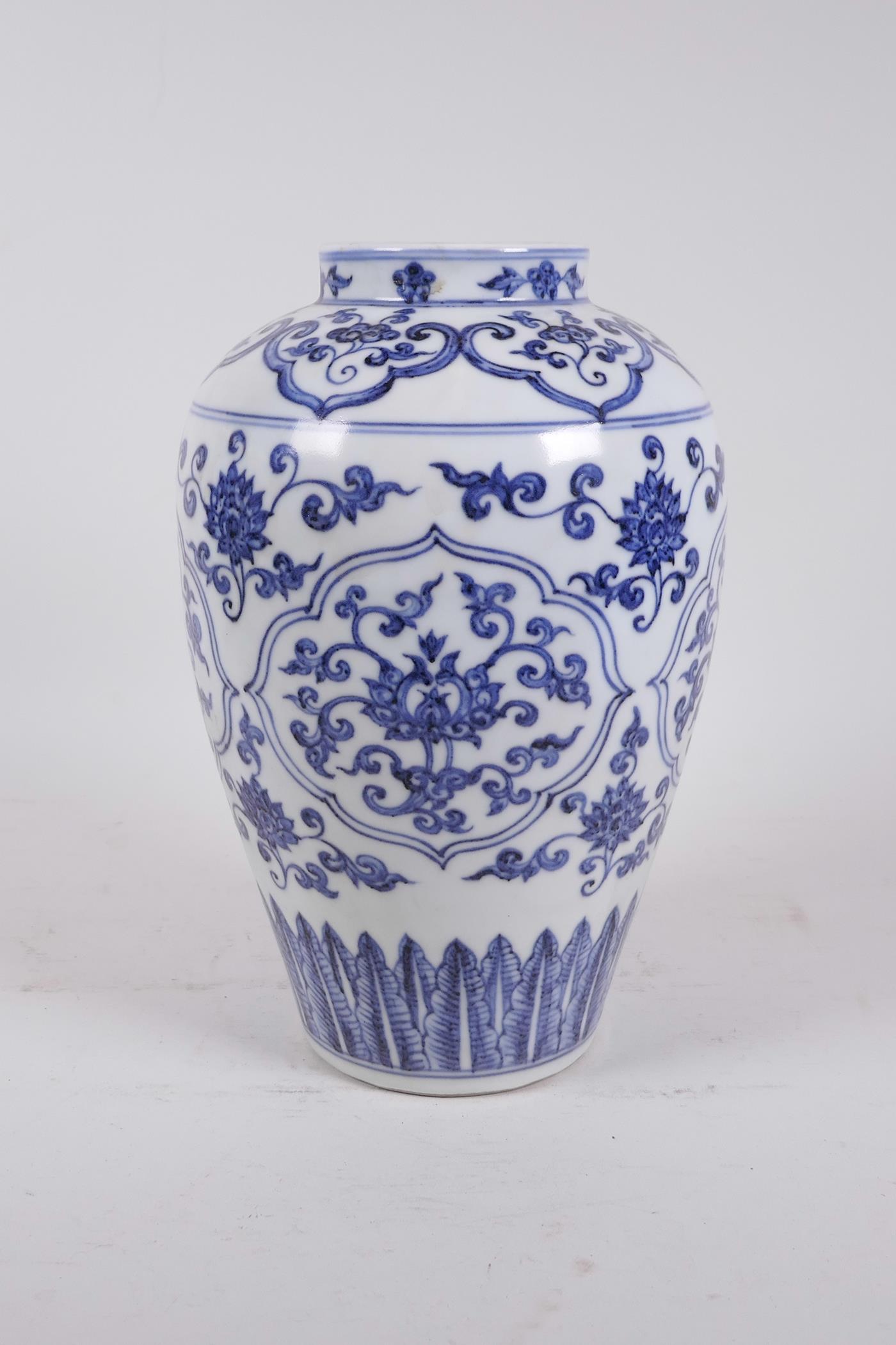 A Chinese blue and white porcelain jar decorated with lotus flowers, 6 character mark to base, 10"