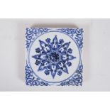 A Chinese blue and white porcelain Ming style temple tile with Yin Yang decoration, 7½" x 7½"