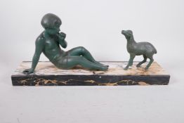 An Art Deco bronzed spelter figure of a young girl and lamb, mounted on a marble base, signed Van de