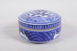 A Chinese blue and white porcelain cylinder box and cover with dragon decoration to cover, 6