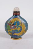 A Chinese cloisonne snuff bottle decorated with a dragon and phoenix in flight, 4 character mark