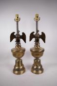A pair of brass table lamps with eagle decoration, 24" high